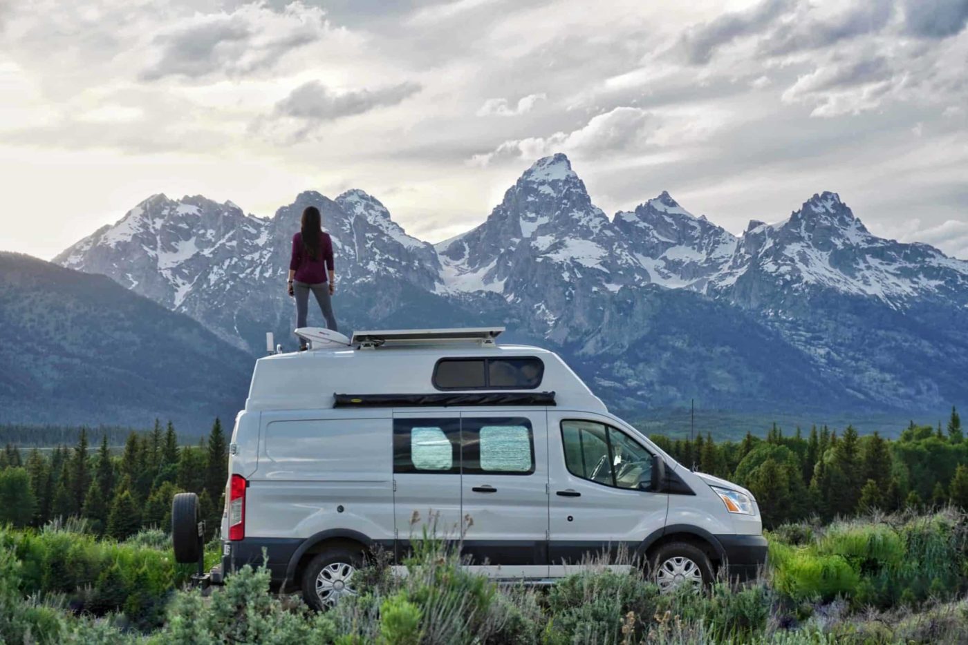 van-in-front-of-Grand-Teton-Mountain-range-scaled